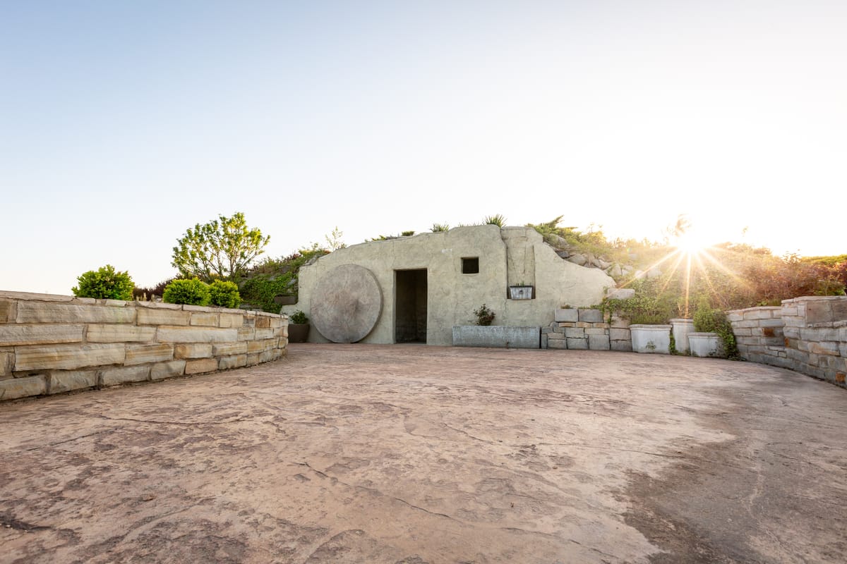 Tomb with the stone rolled away from the door